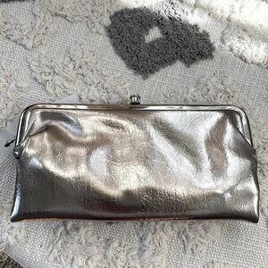 Silver double frame clutch that is actually functional, lots of space, new